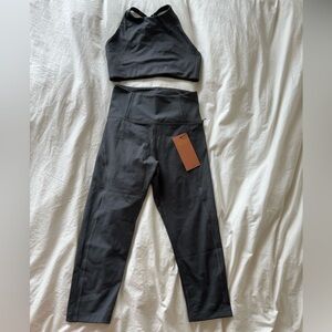 NWT Girlfriend Collective sports bra and leggings set in dark grey size S